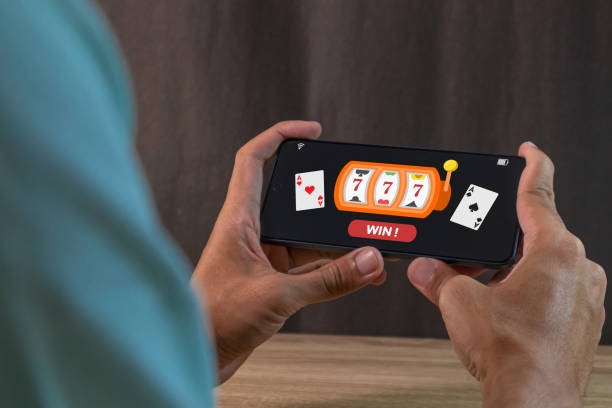 Close-up of redem Grand Slam game interface showing betting controls and payout table
